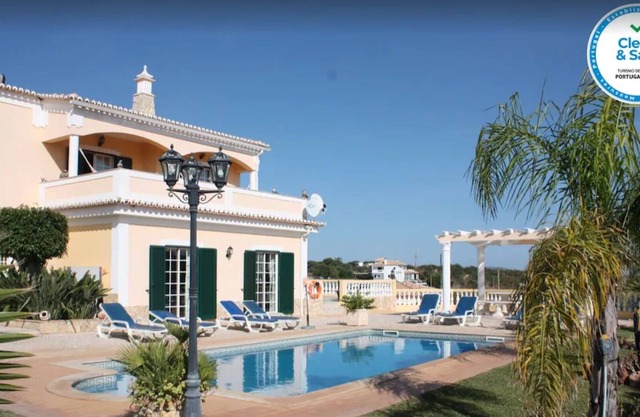 Casa de vacaciones Villa Monte Velho con vistas al mar, piscina, jardín y Wi-Fi