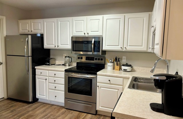 Home in Raleigh with office. Pool. 10 mins to RDU. Central location.