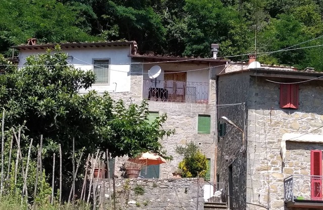 House in a Tuscan village with garden House in a Tuscan village with garden