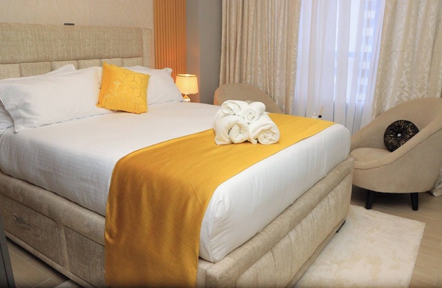 Hughesy Haven. Cozy apartment in Nairobi with WiFi, fitness room and pool