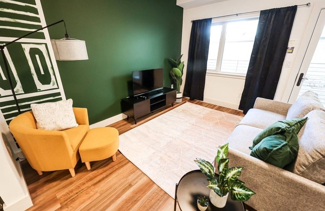 Imagine a stylish escape in Glenwood, the epitome of urban luxury