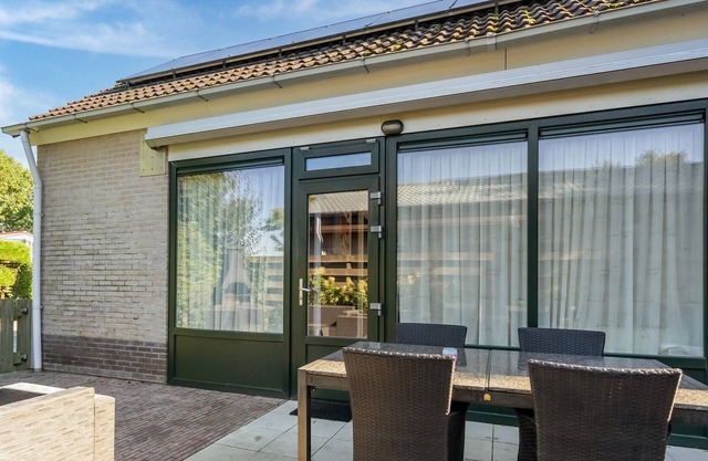 Bonita casa de vacaciones en Baarland con terraza