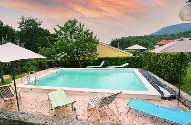 Inviting vacation home with pool and traditional flair.