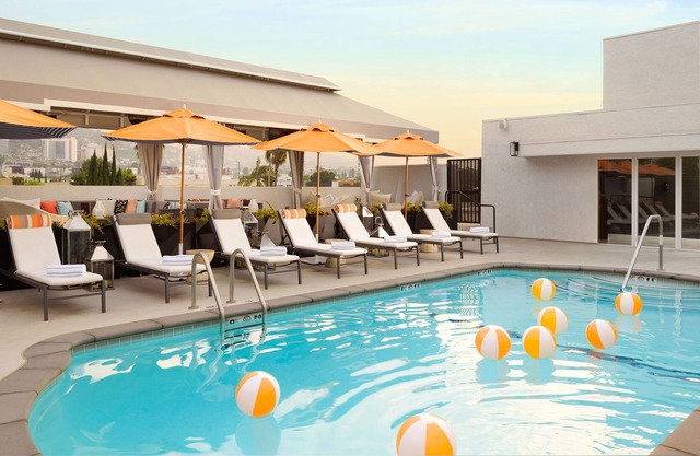King Suite + Balcony | Pool, Bar, Cabanas | Bikes