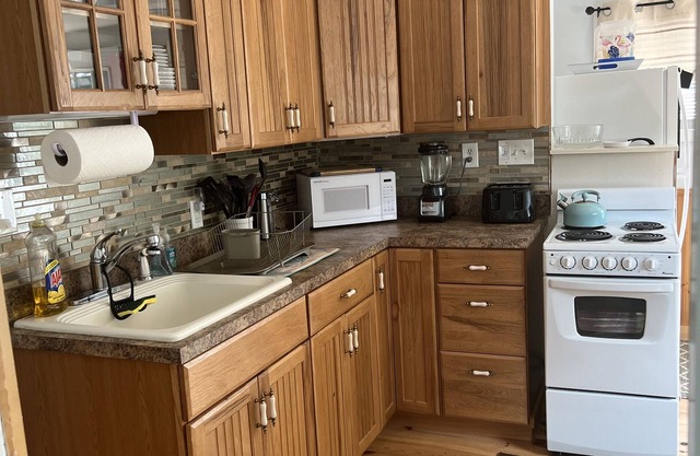Lake Winnipesaukee Guest Cottage Vacation Rental in the heart of Alton Bay, NH!