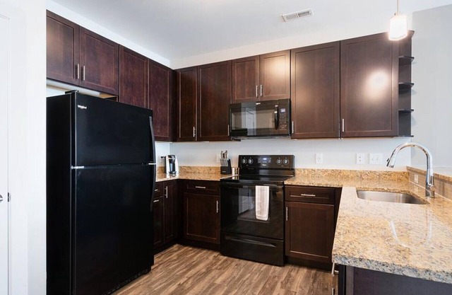 Landing at The Red Apartments - 1 Bedroom in Madisonville