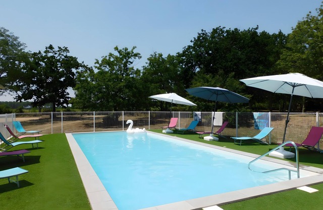 Estudio 'Les Pins - Domaine Des Landes' con piscina compartida, terraza privada y jardín compartido