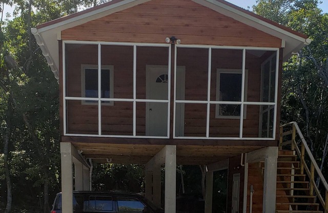 Nestled in a tropical jungle setting near Corozal Bay.