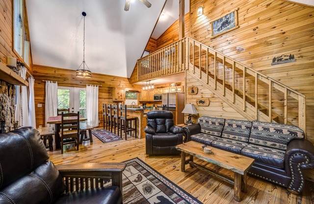 Lovely dog-friendly creekside cabin with fireplace, hot tub, & fire pit