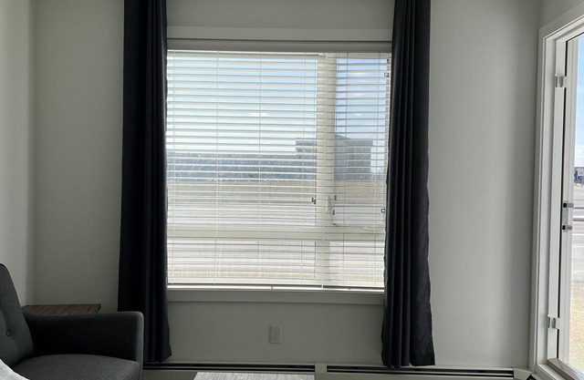 Luxury Airport Suite 2Bed 2Bath w/ heated parking