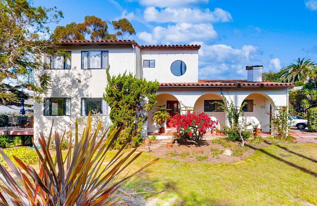 Mediterranean Home with Ocean & Mountain Views, Garden Patios & Great Location