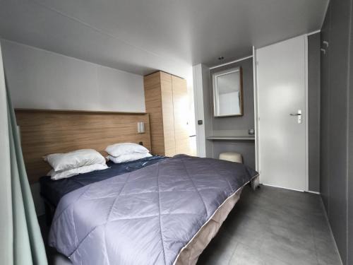 Mobil-home 5 personnes avec terrasse proche de la mer avec piscine et lagon