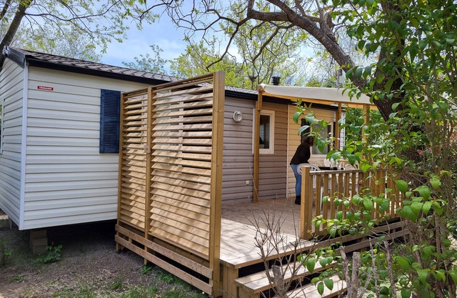 Mobil-home 'Le 147 Aux Iscles' con piscina compartida, terraza privada y aire acondicionado
