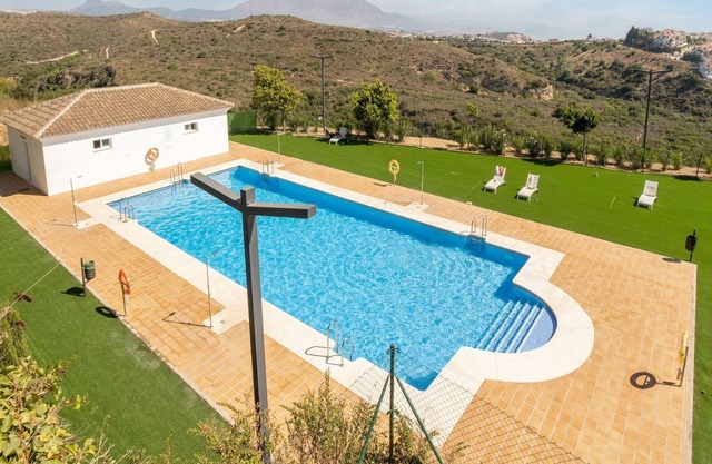 Atractivo apartamento en Manilva con piscina comunitaria, a 5minutos de la Playa