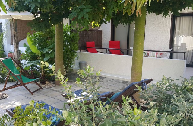 Cerca de la playa Apartamento con jardin