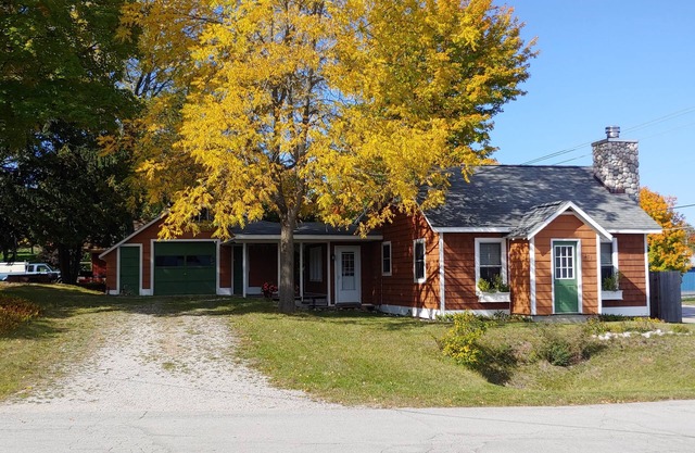 Need a getaway? Charming Lake Leelanau village cottage