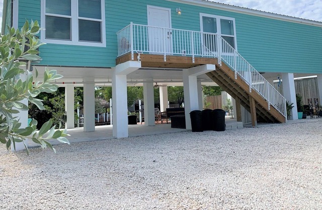 New-build, luxury canal front home w/ dock, firepit, micro pool
