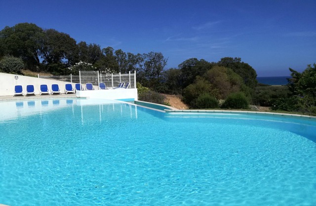 Casa nueva, en una tranquila residencia turística de playa de 3 estrellas