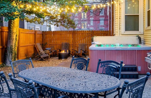 Newly Renovated Home with King Bed, walk to restaurants, shops, and nightlife. Private Fenced Backyard, Hot Tub & Playground