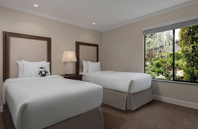 No Dull Moments! 4 Spacious Suites w/ Kitchens, Pool, Onsite Golf, FREE Parking!