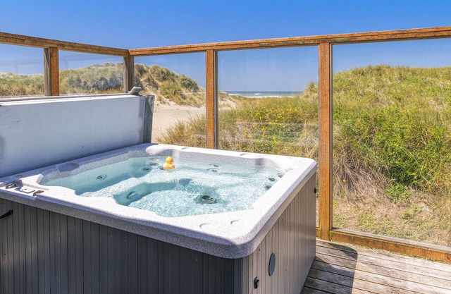 Alquiler de vacaciones frente al mar. ¡Salga directamente de la puerta sobre la arena! ¡Bañera de hidromasaje! ¡NOCHE LIBRE!