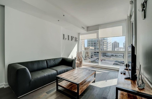 Downtown 2BR Gem with Balcony and Skyline Views