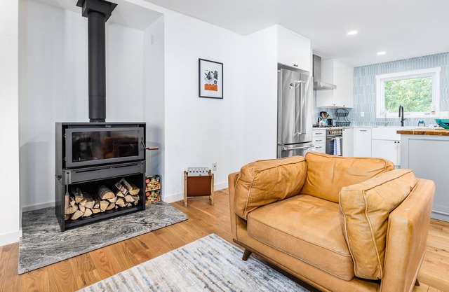 Peaceful dog-friendly home with W/D, woodstove, large yard, deck, & foosball