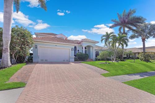 Pet-friendly waterfront home with heated pool and spa