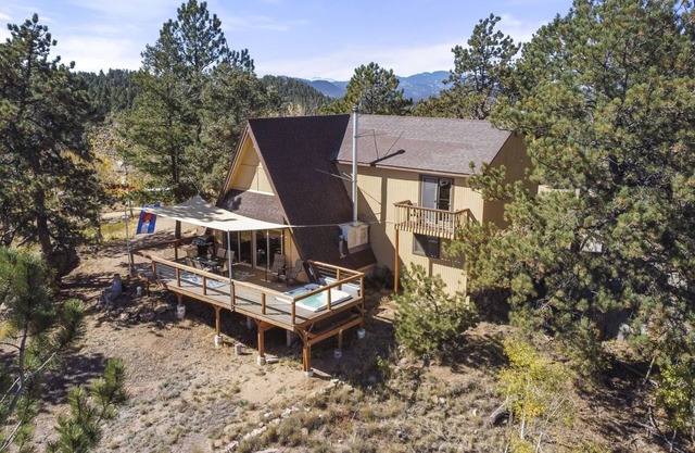 Pikes Peak A-Frame Retreat w/ Hot Tub & stunning mountain views. Pets welcome!