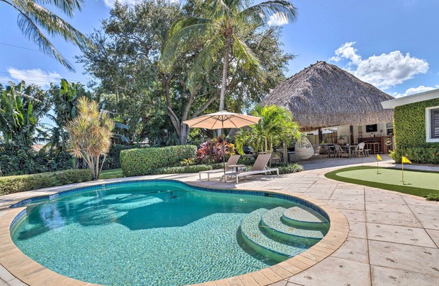 Poolside Paradise w/ Tropical Hut in Palm Beach