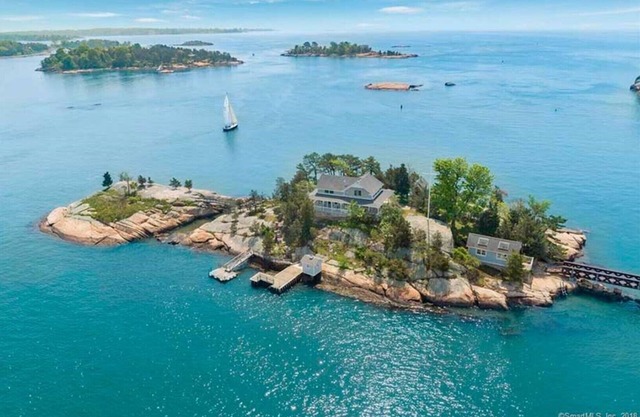 Complejo de isla privada con gran cabaña y casa de huéspedes