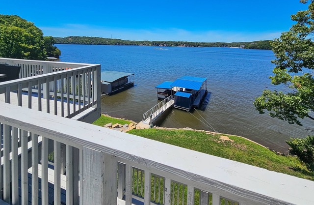 Remodeled panoramic lake view home w/ dock, trailer parking