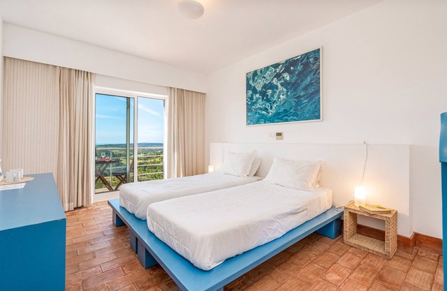 Habitación 'Agosto' con vistas al mar, piscina compartida y Wi-Fi