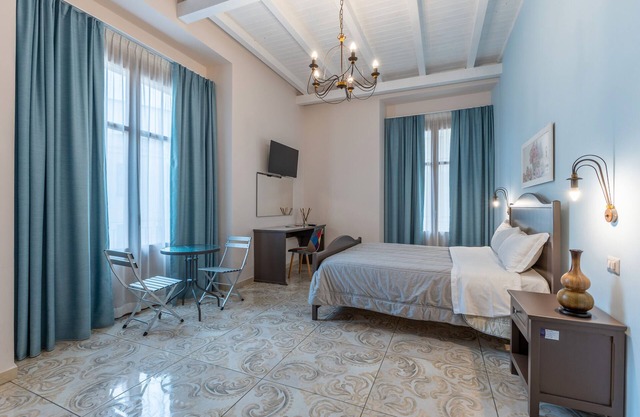 Habitación 'Al Duomo - Camera King' con terraza compartida, Wi-Fi y aire acondicionado.