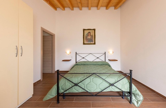 Habitación 'Camera 2' con piscina compartida, jardín compartido y aire acondicionado.