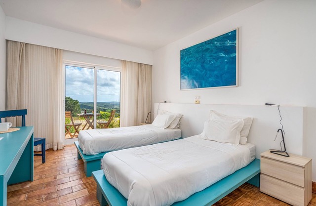 Habitación 'Janeiro' con vistas al mar, piscina compartida y Wi-Fi