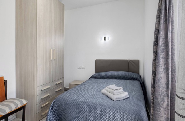 Habitación 'Nespola' con terraza compartida, Wi-Fi y aire acondicionado
