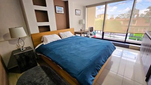 S01 SUITE CON CAMA KING SIZE Premium Frente al TEC CEM con Cocineta WiFi Balcón Parking Terraza 10