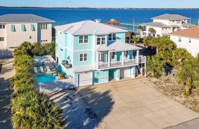 Stunning Waterfront Home w/ Private Pool and beautiful NEW Tiki Bar!