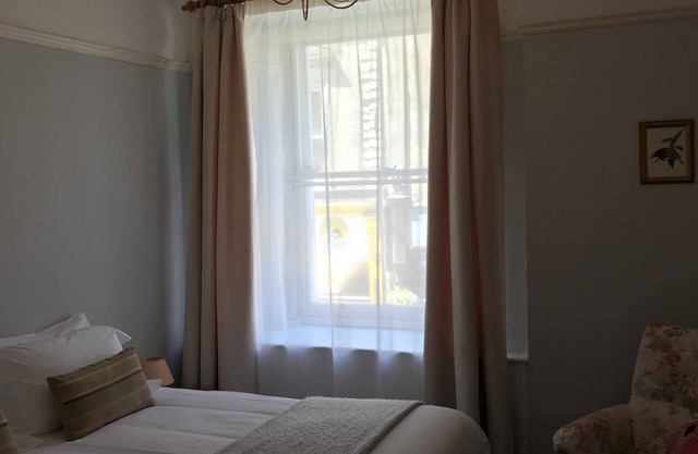 Apartamento-Clásico-Baño Privado-Vista a la Calle