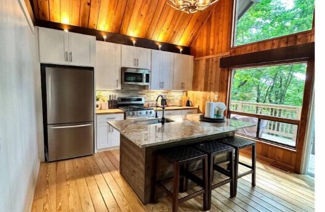 Serene Chalet Surrounded by Trees with Hot Tub & Resort Amenities