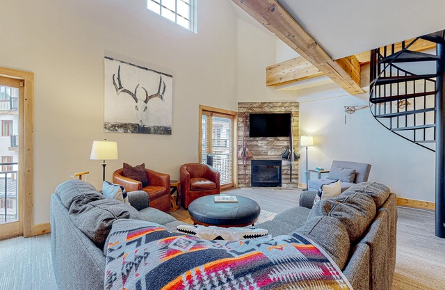 Ski-in/out condo with mountain views, central location, & fireplace