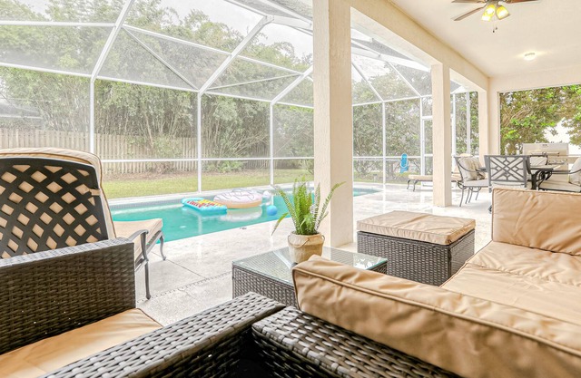 Snowbird-friendly home with private pool, screened lanai, game room, grill, AC