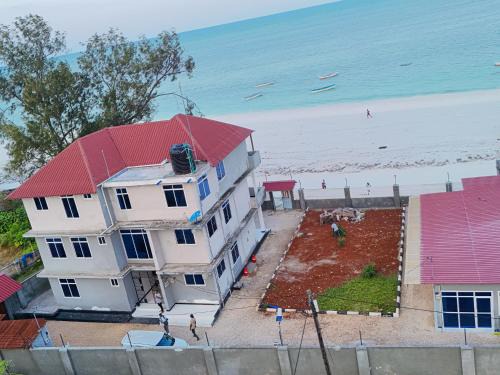 Spacious Beachfront Condo -AC - WiFi, Uroa Escape Zanzibar