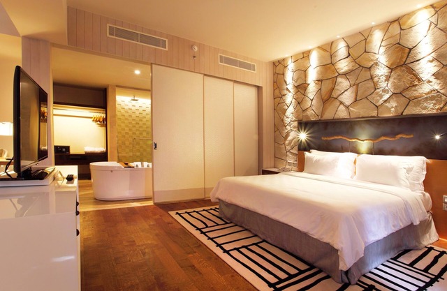 Amplia y moderna suite con artículos gratuitos de minibar (T Sand Suite25)