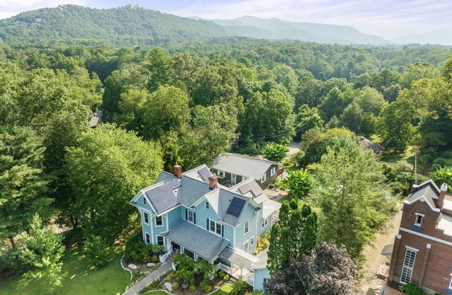 Stunning Restored Victorian on a Picturesque Lot with Flower Garden & Fountain