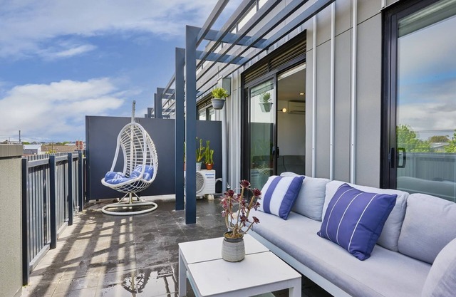 Sunlit home Private Balcony with city views