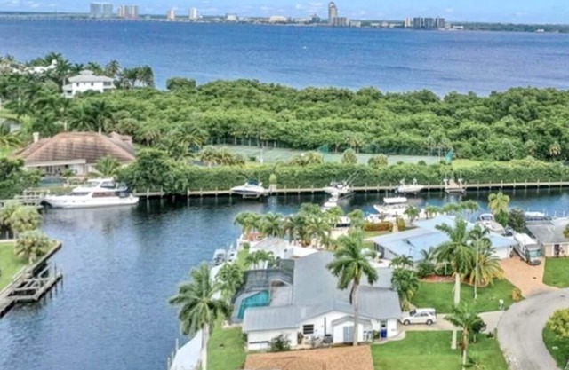 Sunny Canal-Front Home w/ Lanai & Grill!