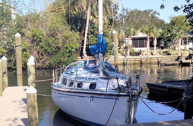 The Classy Sailor a 31' Sloop at dock in Manatee Pocket Entertainment District