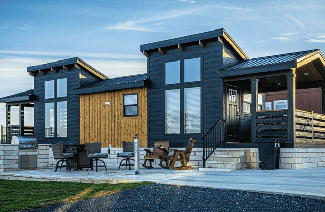 Black Western-Themed Tiny Home 'The Willie' Offers Luxe Hideout Near Luckenbach's Live Music Scene w